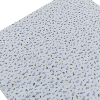 Tela de popelín con estampado de patitos en tonos gris plata