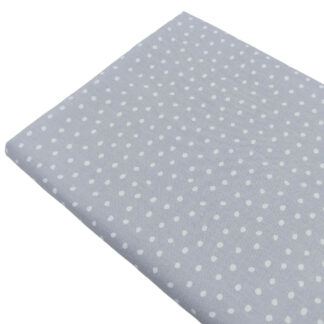 Tela de viyela estampada con lunares sobre fondo gris plata