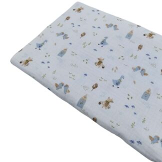 Tela doble gasa muselina con estampado de animalitos de corral en tono azul empolvado