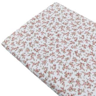 Tela de viyela estampada con flores tipo liberty en tono rosa empolvado