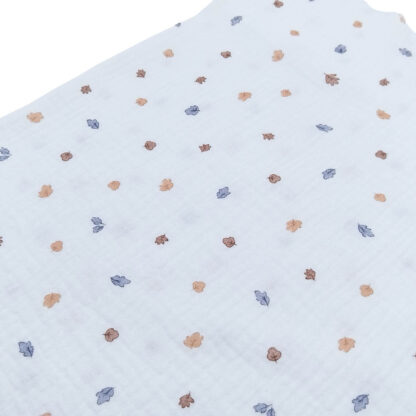 Tela doble gasa muselina con estampado de hojas en tono azul