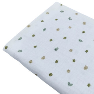 Tela doble gasa muselina con estampado de hojas en tono verde