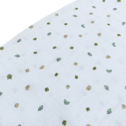 Tela doble gasa muselina con estampado de hojas en tono verde