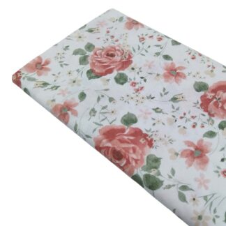 Tela viyela de algodón con estampado de flores de diferentes tamaños en tonos terracota, rosa y verde