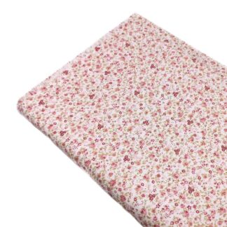 Tela viyela de algodón orgánico con estampado de flores tipo liberty en tonos rosa palo