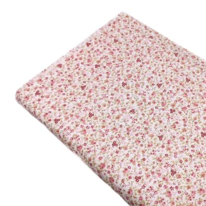 Tela viyela de algodón orgánico con estampado de flores tipo liberty en tonos rosa palo