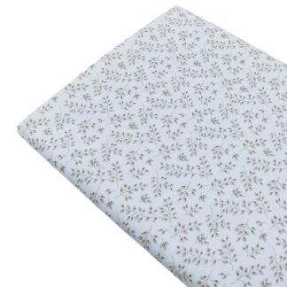 Tela viyela de algodón con estampado de ramas en tono beige