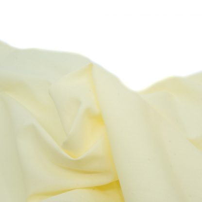Tela de batista amarilla para coser sábanas