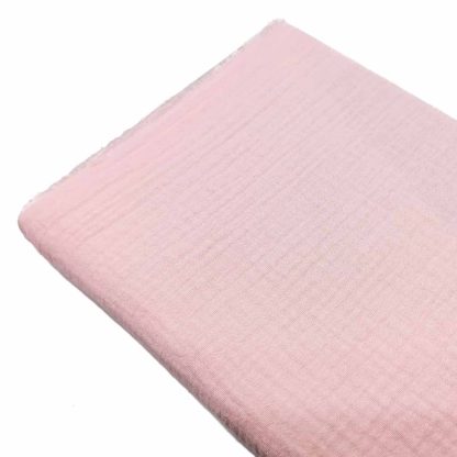 Tela doble gasa muselina de algodón orgánico GOTS en color rosa bebé
