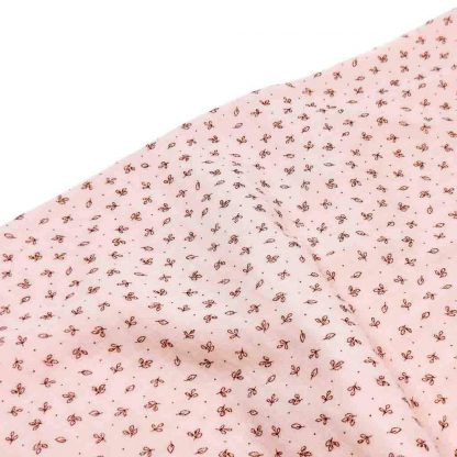 Tela doble gasa muselina de algodón orgánico GOTS estampada flores sobre fondo en color rosa