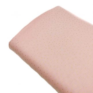 Tela batista de algodón orgánico tipo voile estampada con mini topos color dorado sobre fondo color rosa empolvado